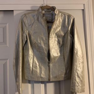 White House/Black market 100% genuine leather gold jacket!! It’s pale gold.